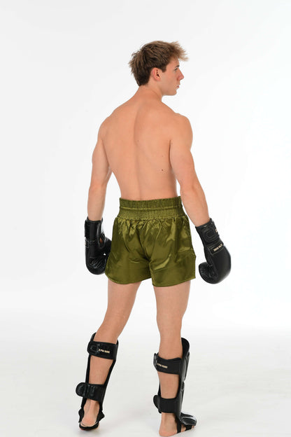 Zwarte Scheenlap met Beige Signature Detail