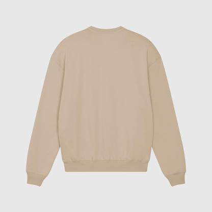 Beige trui met kenmerkende borduursels